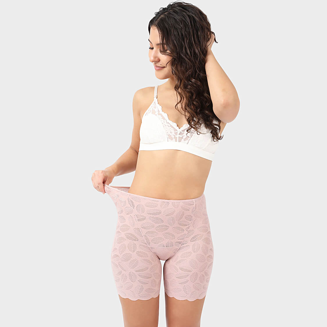 White lace bralette and pink lace under dress shorts